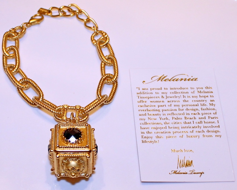 Melania Goldtone Vintage Design Charm Faux Black Onyx Bracelet with romance card.
