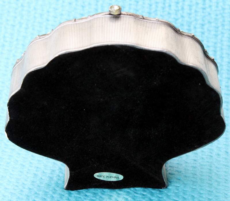 Rear View of the Pewter Shell with Faux Diamonds Containing 5 Shell Refrigerator Magnets