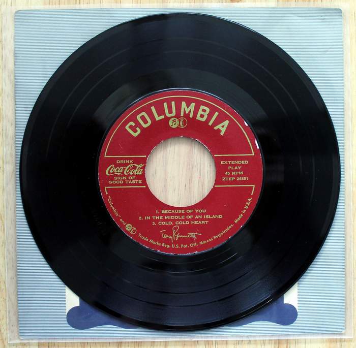 Side 1 - Tony Bennett 45 Extended Play with 6 songs Coca Cola Promo on Columbia Label kept in original cover inside a plastic jacket.  Released as promo for Coca-Cola circa 1960s.
